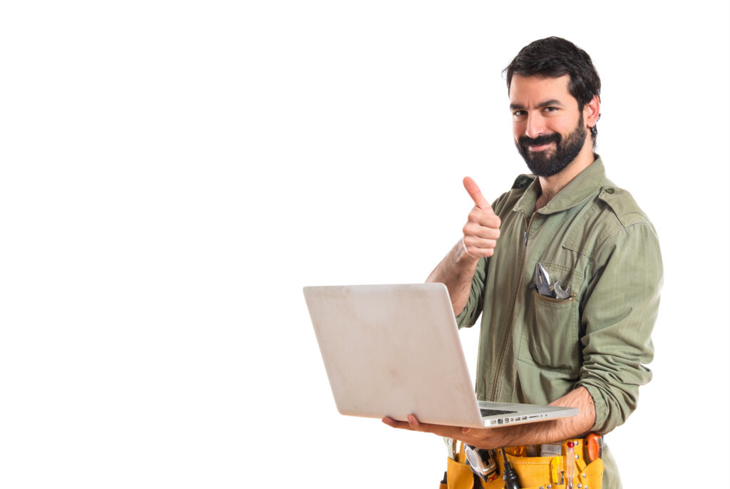 mechanic with laptop over white background